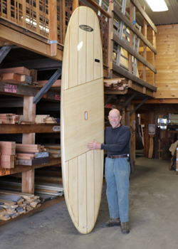 Carl Mahlstedt posed with his wooden SUP